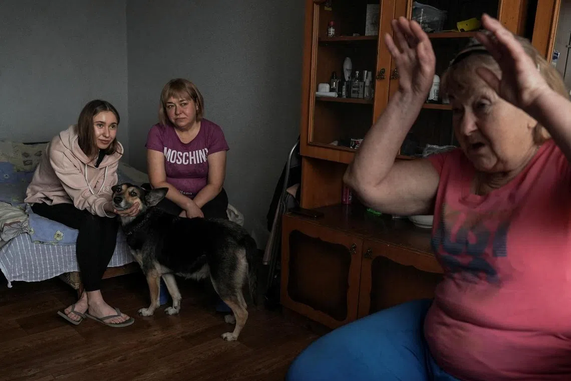 Mrs Alla Antonova and her daughter Anastasia, with Mrs Antonova's mother, Mrs Natalia Kucherova. They escaped to Ukraine's capital, Kyiv via a five-day circuitous journey that took them through southern Russia.
