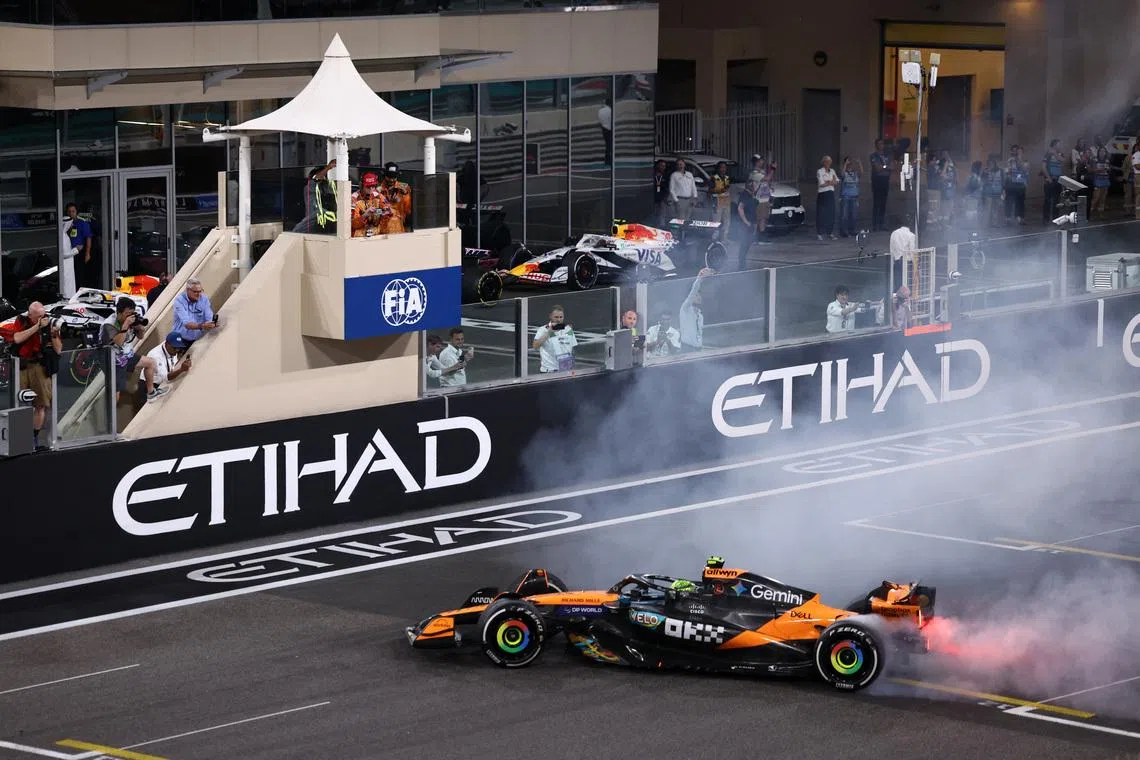 Formula One F1 - Abu Dhabi Grand Prix - Yas Marina Circuit, Abu Dhabi, United Arab Emirates - December 7, 2025 McLaren's Lando Norris celebrates after becoming the 2025 Formula One World Champion REUTERS/Amr Alfiky