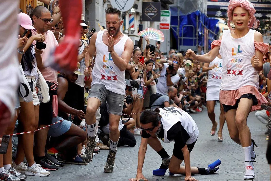 Contestants take part in the annual race on high heels during Pride celebrations in the quarter of Chueca in Madrid, Spain, June 29.