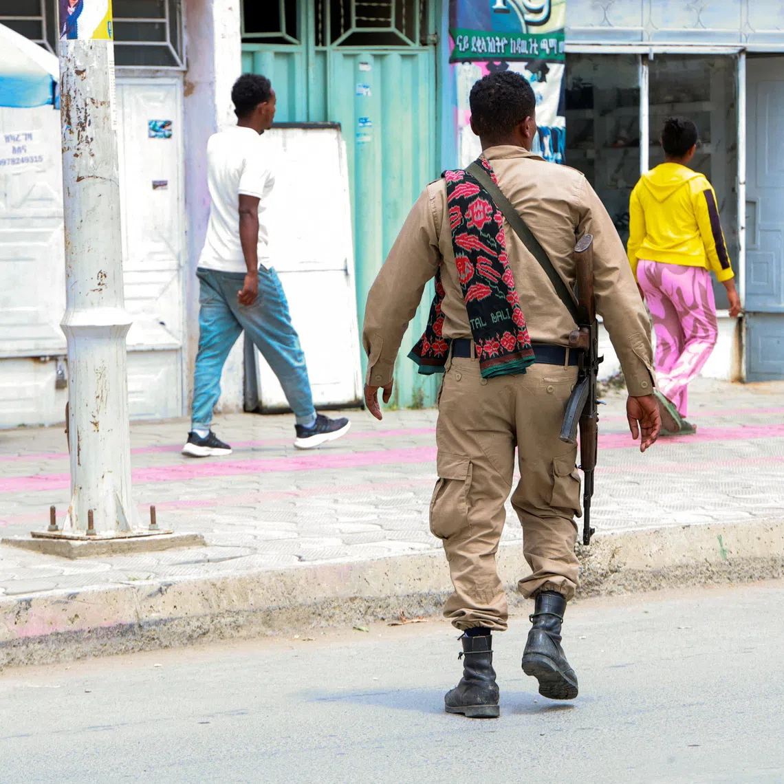 A member of the Tigrayan forces walks along a street as tensions intensify after the forces launched a major offensive against the federal government in multiple locations, in Mekelle, Tigray Region, Ethiopia, September 24, 2026. Obtained by REUTERS