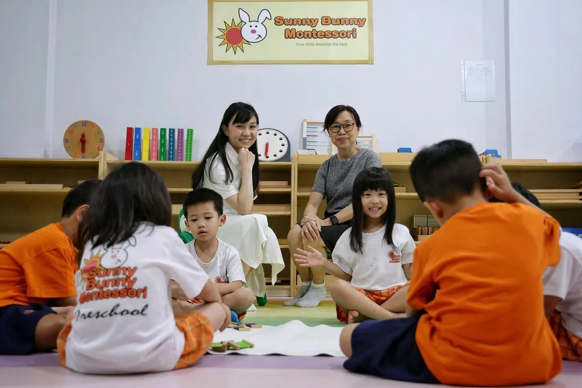 Ms Poh Ying Xia (left), 38, co-founder of Sunny Bunny Montessori Infantcare and Preschool, and her mother, Ms Ng Chooi Choo, 68, a retired teacher, at the preschool on March 10, 2026. Feature on inter-generational learning: Ying Xia, who bought over her autistic son's preschool, and her retired mother, a former teacher, are doing an NIE diploma course on early childhood development together.