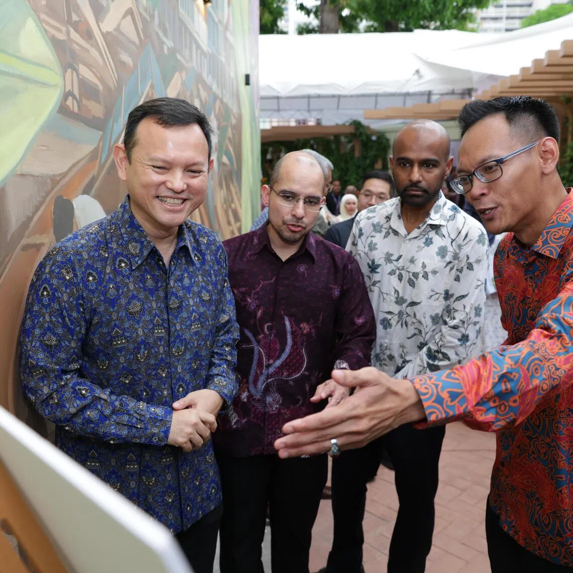 (From left) Acting Minister-in-charge of Muslim Affairs Zaqy Mohamad, Senior Parliamentary Secretary for Education and National Development Syed Harun Alhabsyi, and West Coast-Jurong West GRC Hamid Razak at the opening of Jamae Chulia Heritage on Oct 24 in Chinatown.