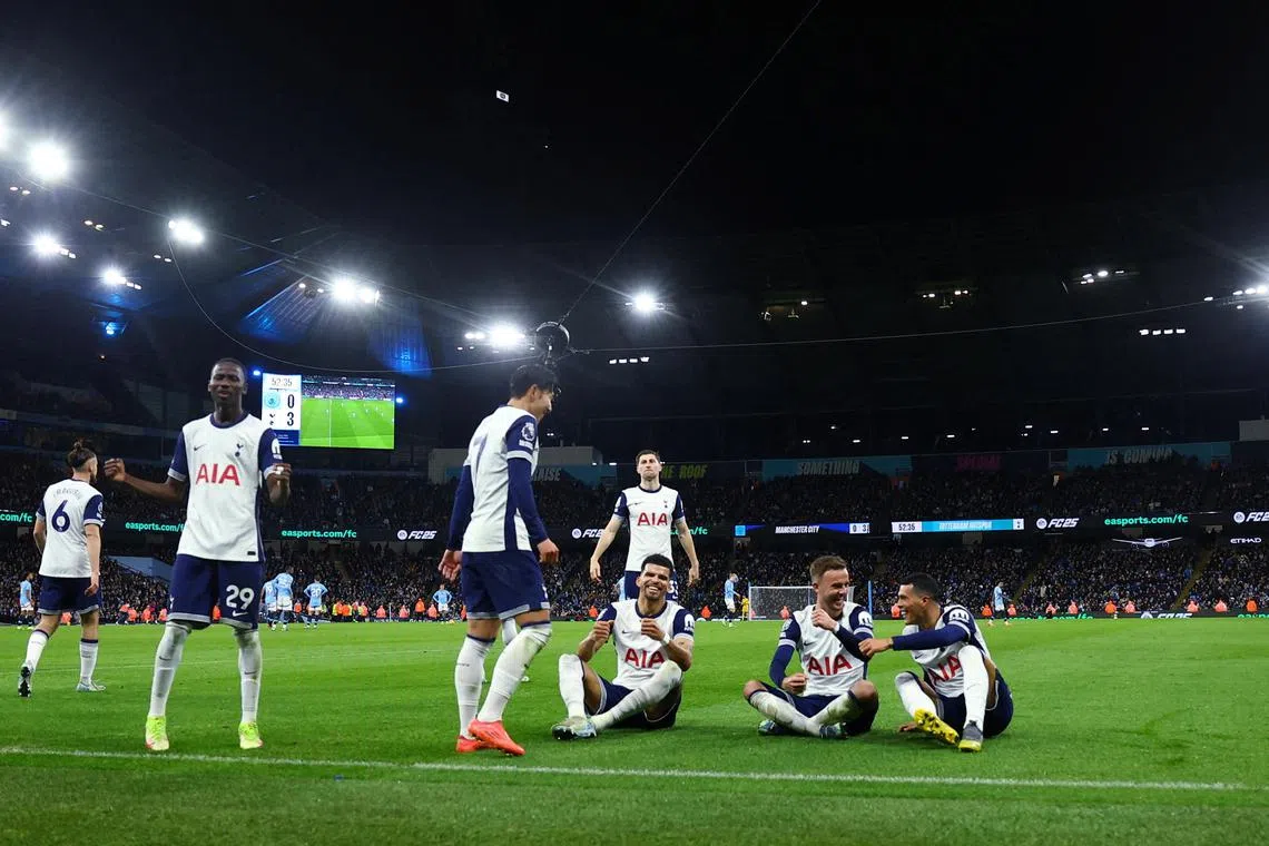 Tottenham Hotspur's Pedro Porro celebrates scoring their third goal with Dominic Solanke and James Maddison.