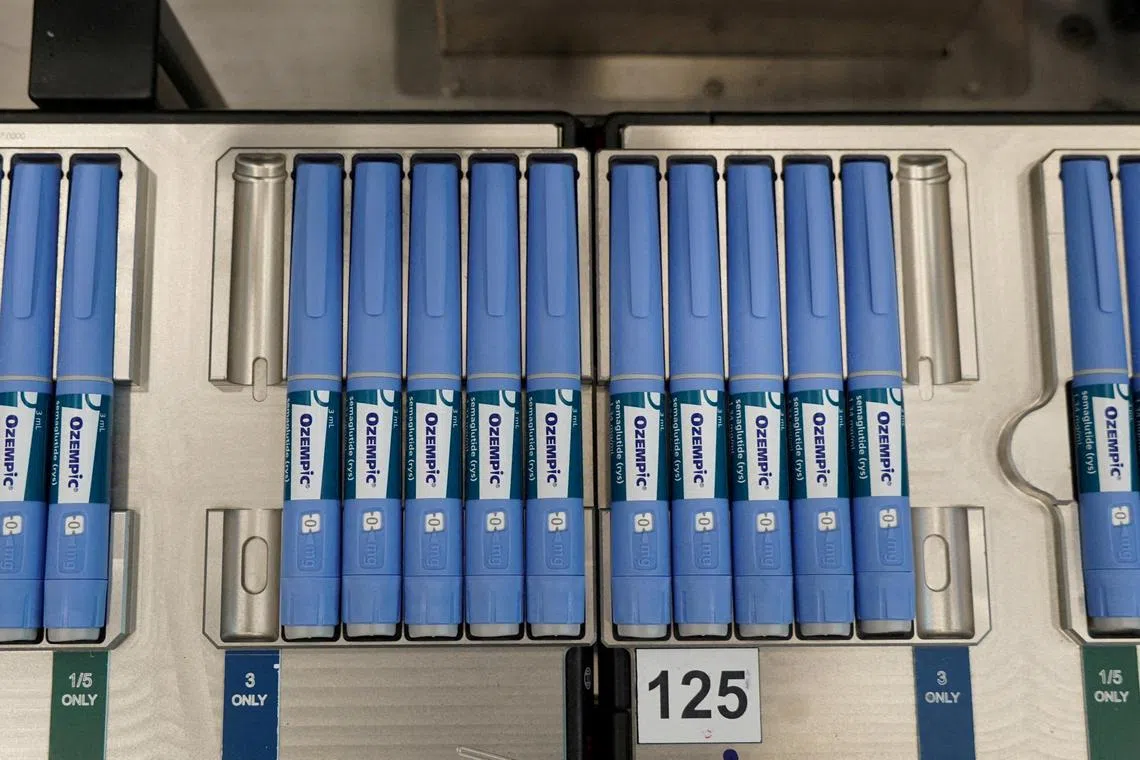 Pens for the diabetes drug Ozempic sit on a production line in Denmark.