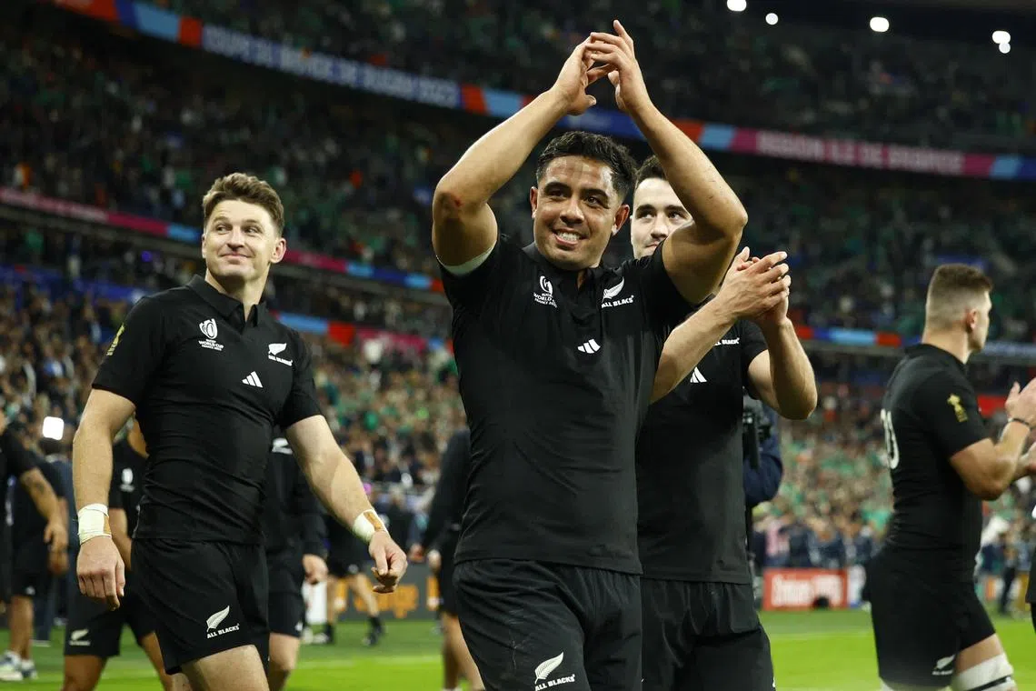 New Zealand's Anton Lienert-Brown celebrates after the match.