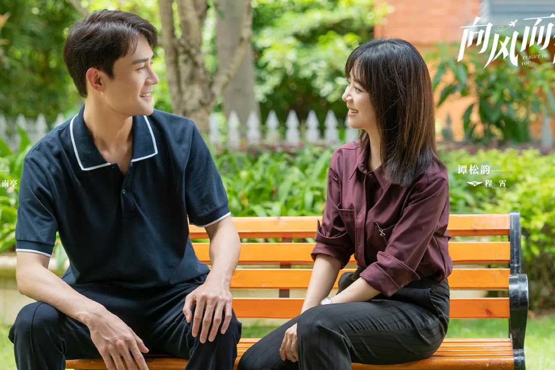 Wang Kai (left) and Seven Tan star in the Chinese TV series Flight To You