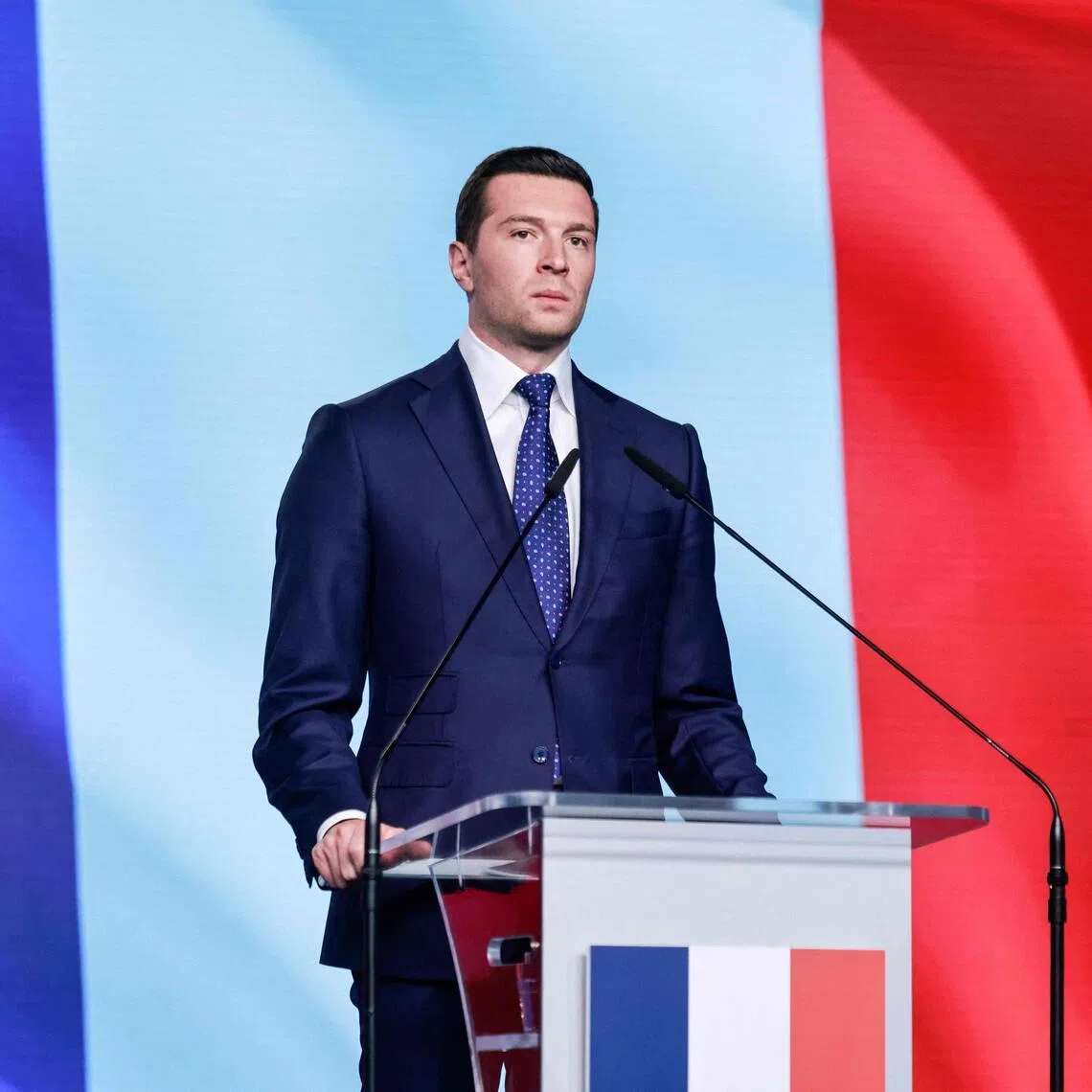 French far-right Rassemblement National (RN) party's President, member of the European Parliament and president of the Patriots for Europe (PfE) group Jordan Bardella attends a joint press conference with the leader of the main opposition right wing Law and Justice (PiS) party at the party's headquarters in Warsaw on June 19, 2026. Jordan Bardella is on a two day visit to poland meeting with leaders of Poland’s far right and touring the eastern border, marking the latest stop on his overseas tour aimed at strengthening his European alliances just a few months before the French presidential election. (Photo by Wojtek RADWANSKI / AFP)