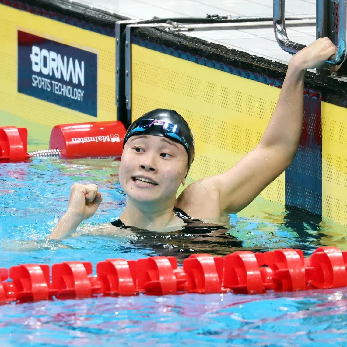 Singapore’s Gan Ching Hwee after touching the wall second in the Asian Games women’s 800m freestyle final to add to her silvers in the 400m and 1,500m events.