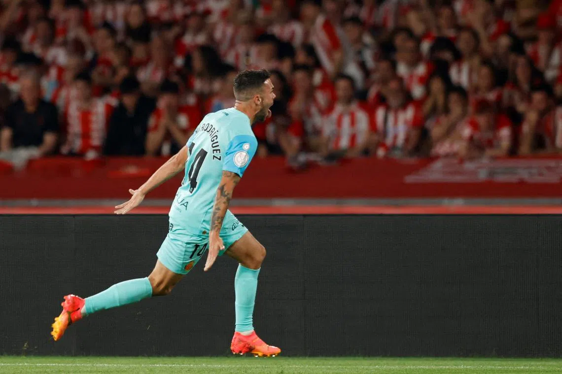 FILE PHOTO: Soccer Football - Copa del Rey - Final - Athletic Bilbao v RCD Mallorca - Estadio de La Cartuja, Seville, Spain - April 6, 2024 RCD Mallorca's Dani Rodriguez celebrates scoring their first goal REUTERS/Marcelo Del Pozo/File Photo