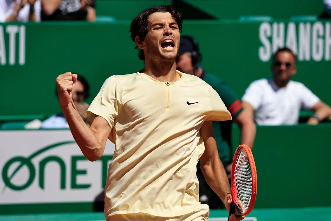 The United States' Taylor Fritz celebrating after winning his quarter-final match against Greece's Stefanos Tsitsipas at the Monte Carlo Masters on Friday.