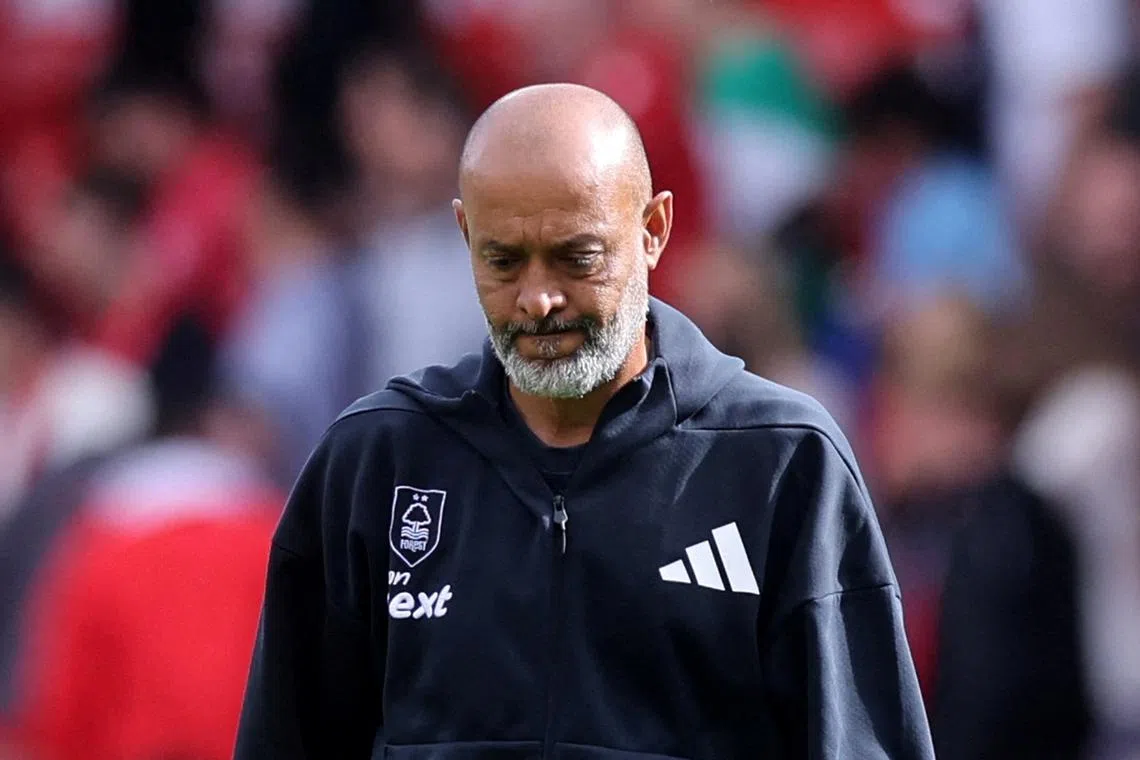 FILE PHOTO: Soccer Football - Premier League - Nottingham Forest v West Ham United - The City Ground, Nottingham, Britain - August 31, 2025 Nottingham Forest manager Nuno Espirito Santo looks dejected after the match REUTERS/David Klein /File Photo
