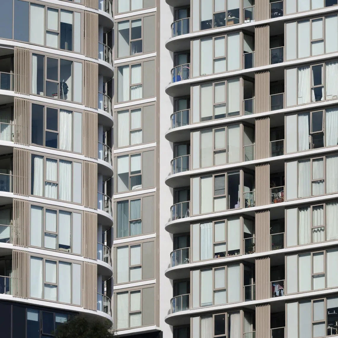FILE PHOTO: An apartment block stands in Sydney, Australia, May 12, 2026. REUTERS/Hollie Adams/File Photo