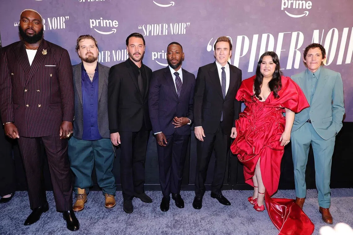 (From left) Abraham Popoola, Andrew Caldwell, Jack Huston, Lamorne Morris, Nicolas Cage, Karen Rodriguez and Lukas Haas at the Spider-Noir world premiere on May 13, in New York City.