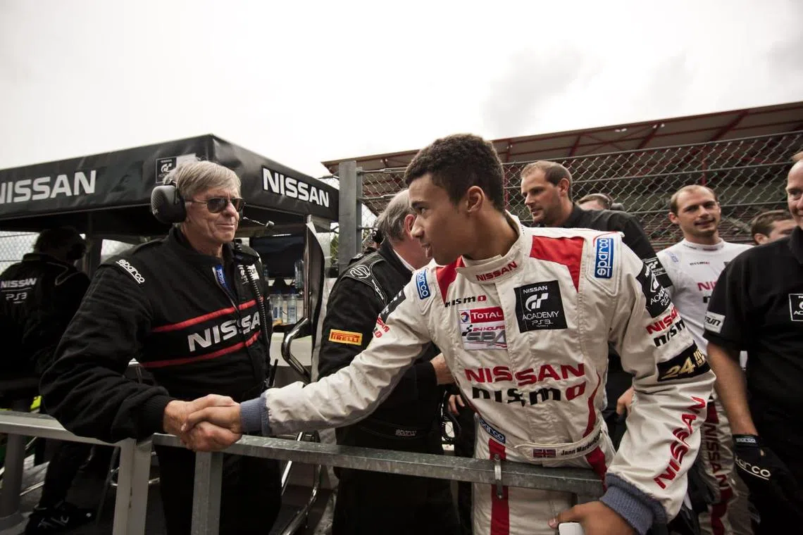 An undated photo provided by Nismo shows Jann Mardenborough, right, who began driving formula cars professionally after learning on the video game Gran Turismo. (Nismo via The New York Times) Ñ NO SALES; FOR EDITORIAL USE ONLY WITH NYT STORY SLUGGED GRAN TURISMO JOURNEY BY BRANDON YU FOR AUG. 25, 2023. ALL OTHER USE PROHIBITED. Ñ