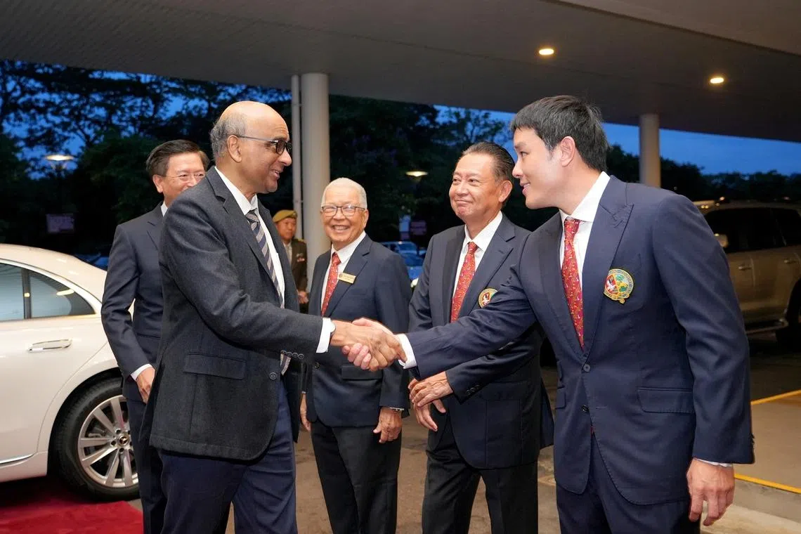 SICC club captain and organising committee chairman Lam Zhiqun (far right) welcomes guest-of-honour President Tharman Shanmugaratnam to the SICC May Day Charity gala dinner at the Grand Island Ballroom. Others in the picture are (from right): SICC chairman Neo Kian Hong, club president Koh Ban Heng and club vice-president Yoshihiro Hirooka.