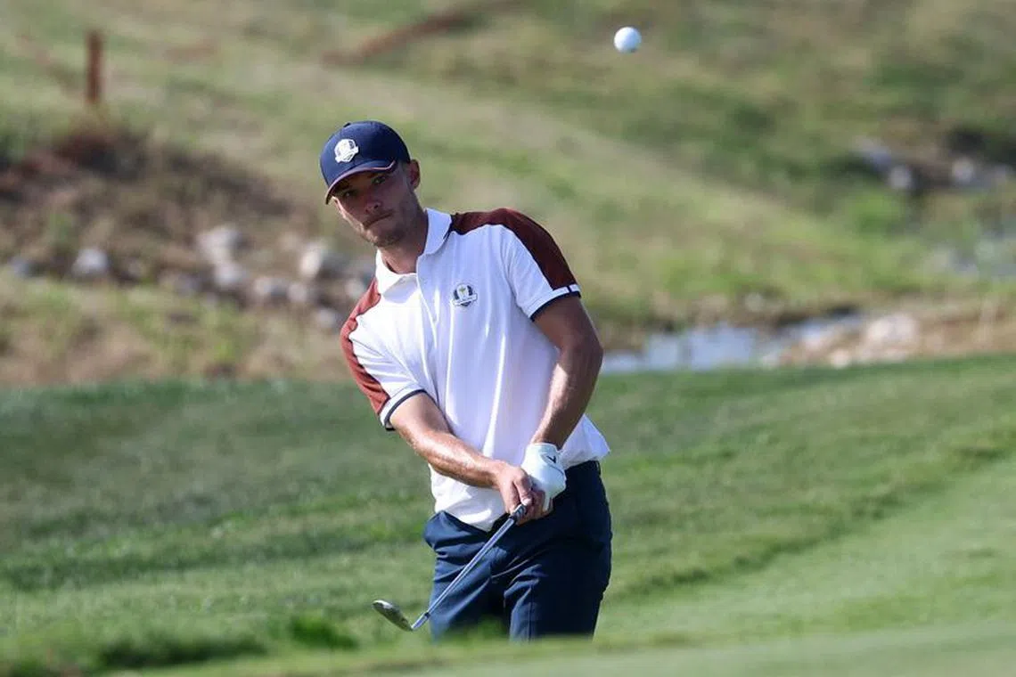 Golf - The 2023 Ryder Cup - Marco Simone Golf & Country Club, Rome, Italy - September 30, 2023  Team Europe's Nicolai Hojgaard chips onto the green on the 10th hole during the Four-Balls REUTERS/Guglielmo Mangiapane/File Photo