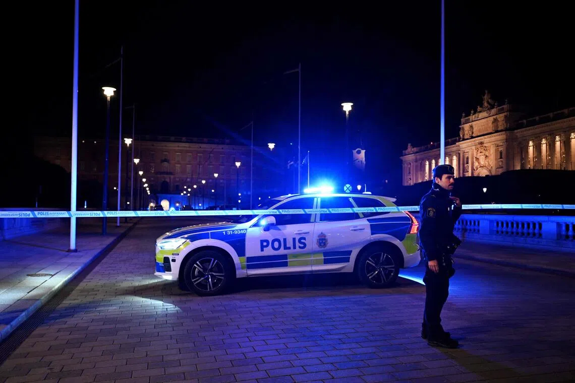A police cordon in place after officers shot a man armed with a knife near the Royal Palace in central Stockholm, on Oct 6.