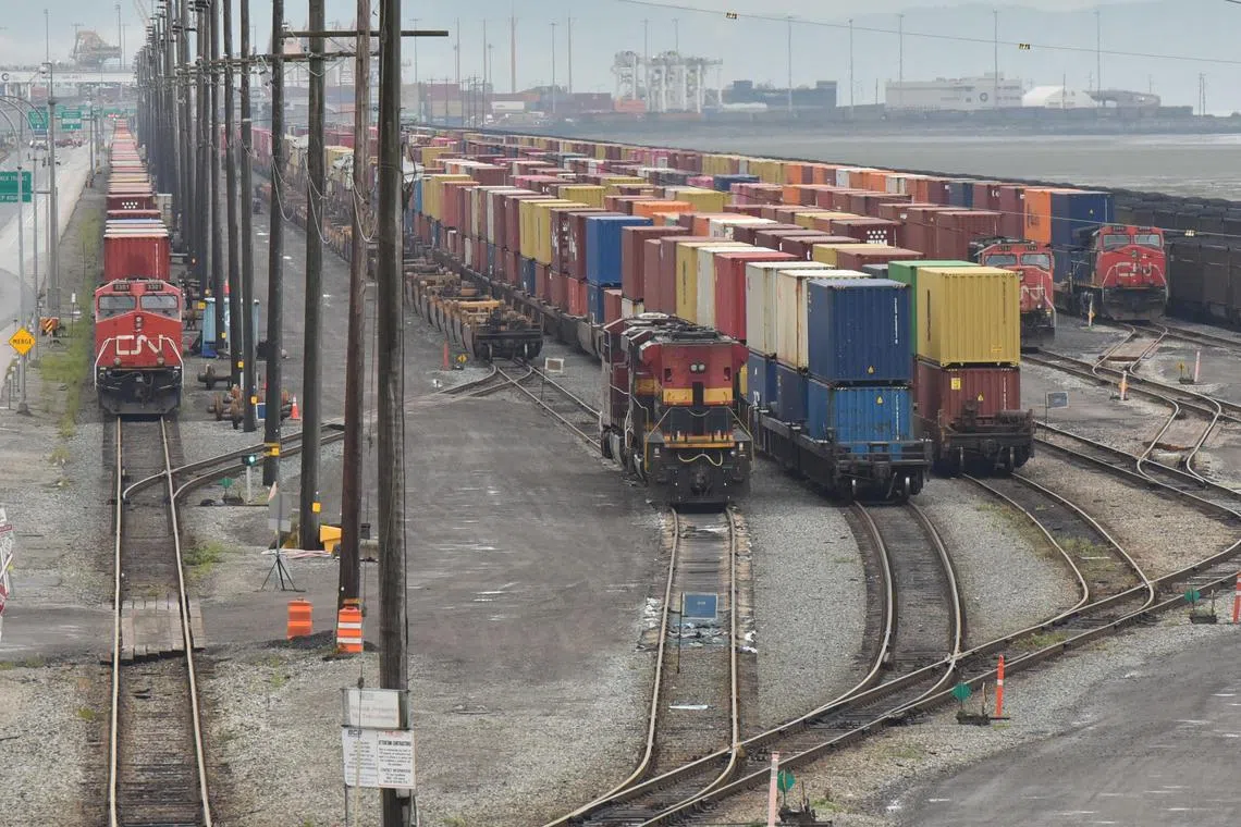 Railcars with containers sit idle near the Roberts bank Super Port after a strike by railway workers on Aug 23 in Delta, British Columbia, Canada. 