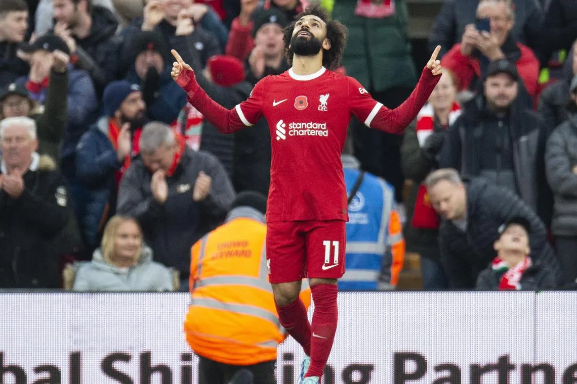 Mohamed Salah of Liverpool celebrates after scoring the opening goal against Brentford.