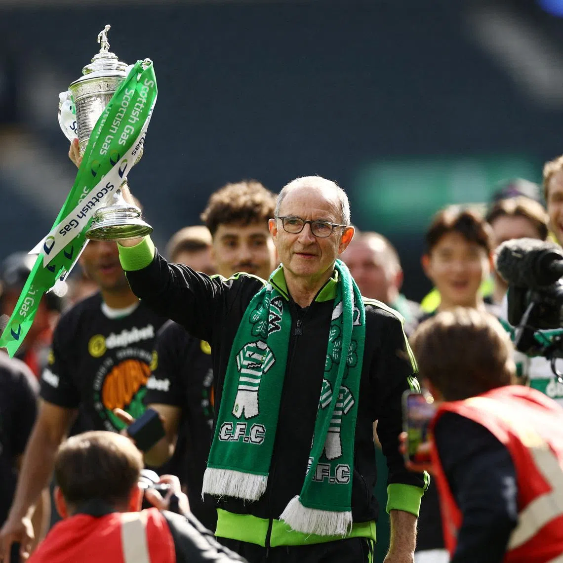 FILE PHOTO: Soccer Football - Scottish Cup - Final - Celtic v Dunfermline Athletic - Hampden Park, Glasgow, Scotland, Britain - May 23, 2026 Celtic manager Martin O'Neill celebrates with the trophy after winning the Scottish Cup Action Images via Reuters/Lee Smith/File Photo