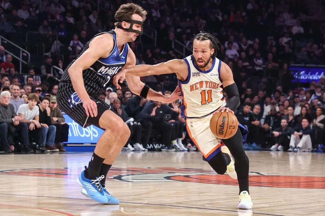 New York Knicks guard Jalen Brunson looks to drive past Orlando Magic forward Franz Wagner in the first quarter at Madison Square Garden.