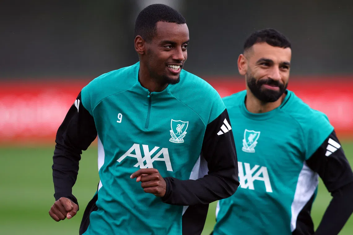 Liverpool's Alexander Isak (left) and Mohamed Salah during training on Sept 16.