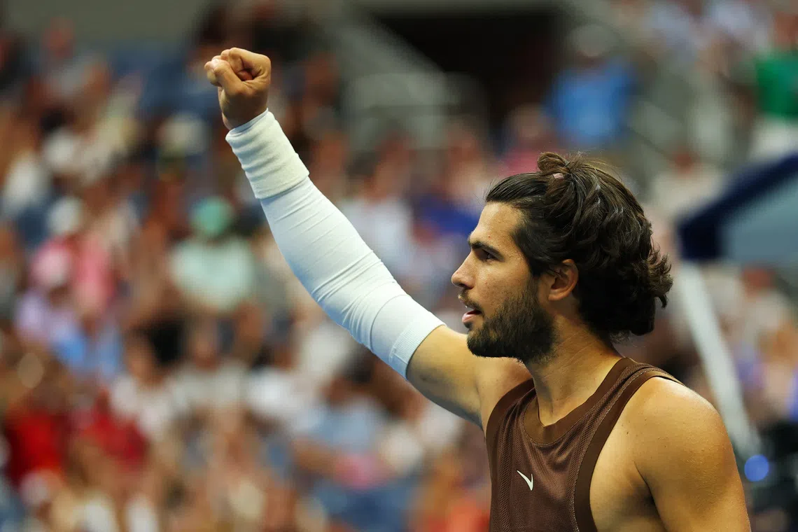 Tennis - U.S. Open - Flushing Meadows, New York, United States - August 31, 2026 Spain's Carlos Alcaraz celebrates after winning his first round match against Russia's Roman Safiullin REUTERS/Mike Segar