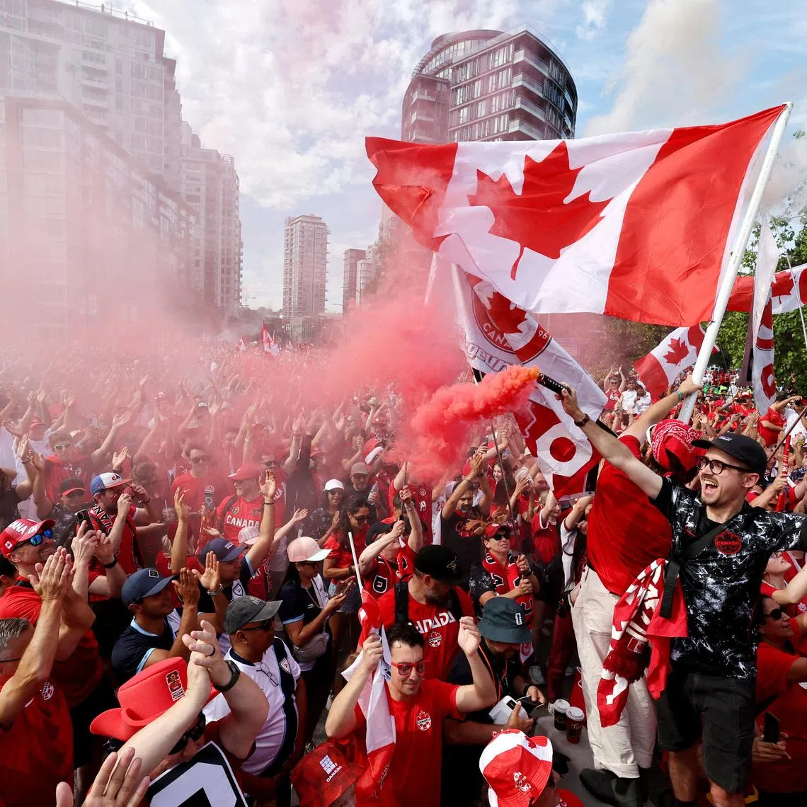 Soccer Football - FIFA World Cup 2026 - Group B - Switzerland v Canada - Canada fans march to the Stadium - BC Place, Vancouver, Canada - June 24, 2026 Canada fans during the march to the stadium REUTERS/Chris Helgren