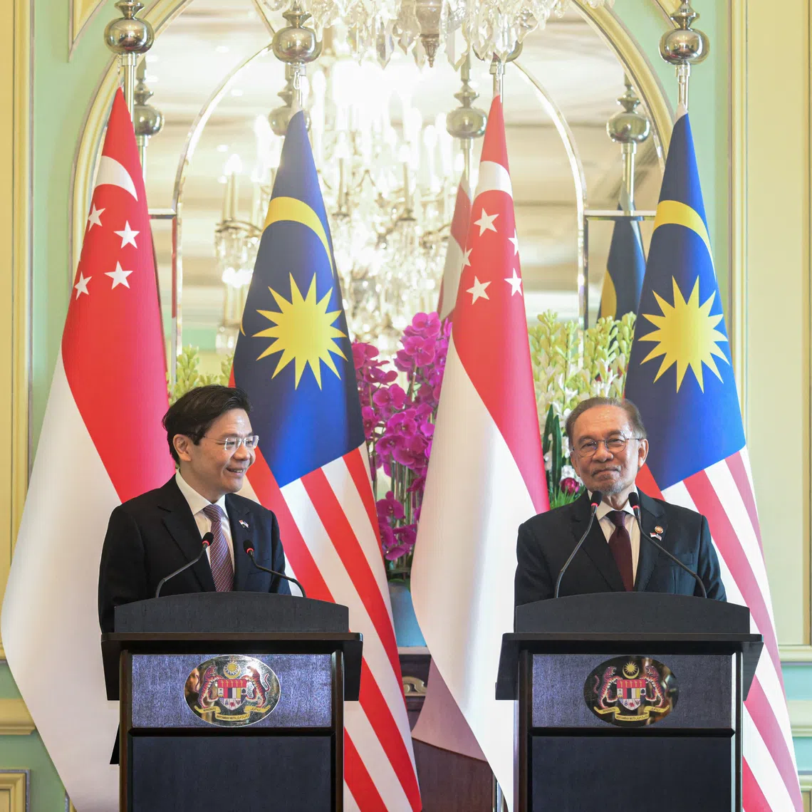 ST20250105_202506400892 pixretreat Azmi Athni// Prime Minister and Minister for Finance Lawrence Wong (left) with Malaysian Prime Minister Anwar Ibrahim (right) during a press conference at Perdana Putra during the retreat on Jan 7, 2025. ST PHOTO: AZMI ATHNI