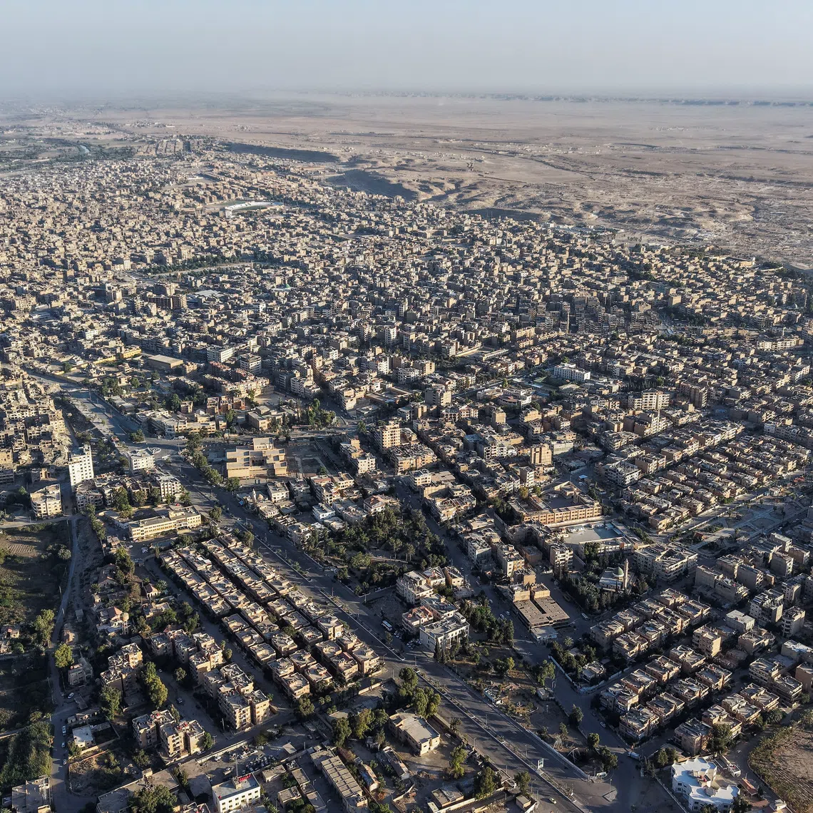 A drone view shows a general panorama of Deir el-Zor, Syria September 29, 2025. REUTERS/Khalil Ashawi