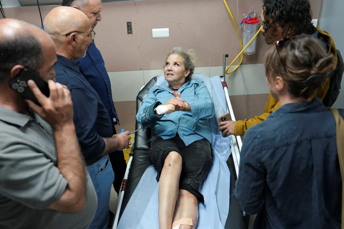 Heidi Levine, a photojournalist with the Washington Post, speaks to journalists at the hospital after sustaining multiple injuries during an attack by Israeli militant settlers on Palestinians harvesting olives, in Ramallah in the Israeli-occupied West Bank, October 16, 2026. REUTERS/Ali Sawafta
