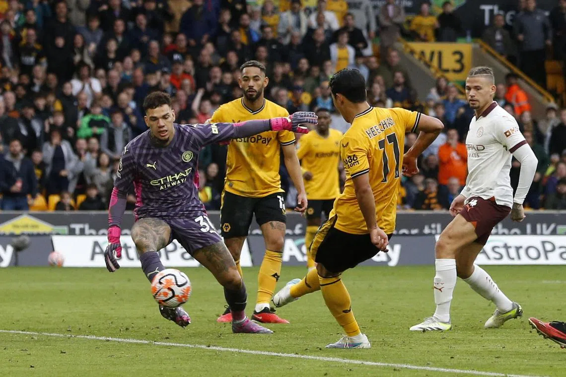 Wolverhampton Wanderers' Hwang Hee-chan scoring against Manchester City.