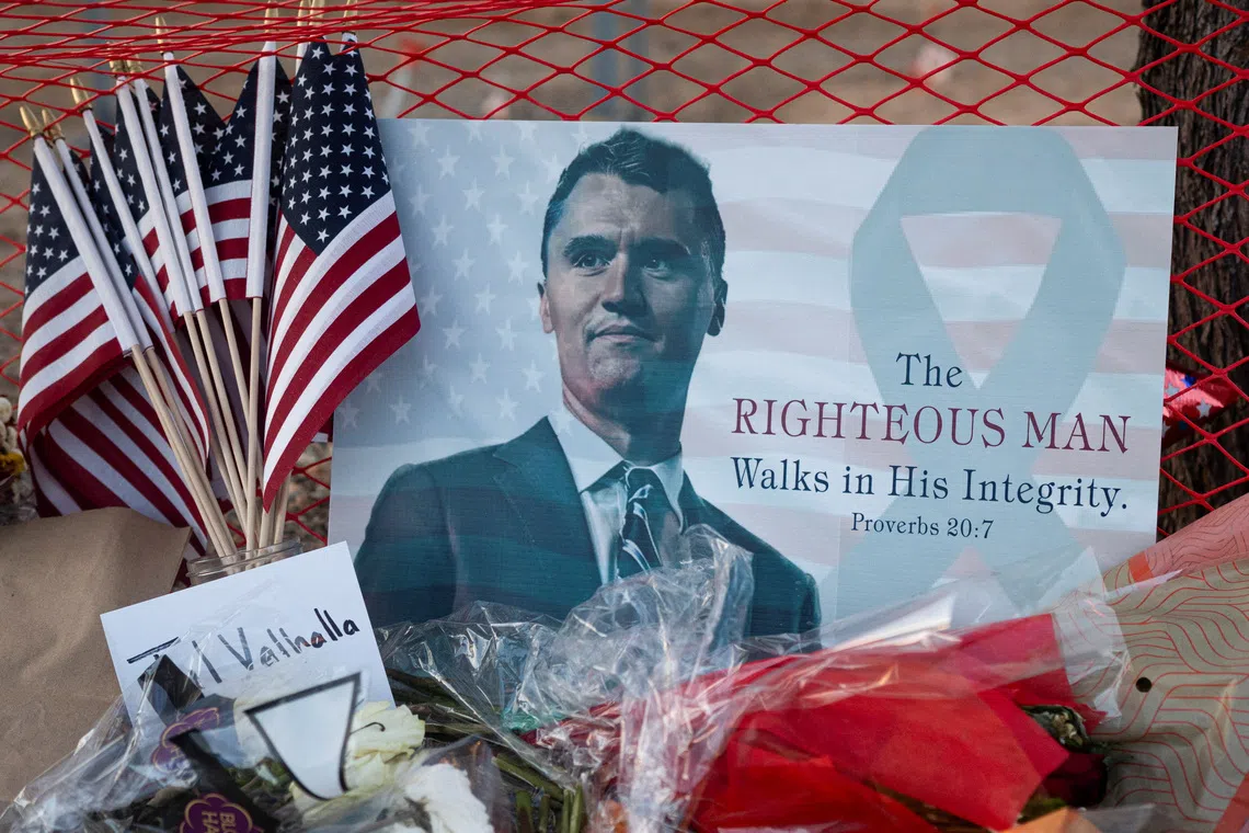 A poster of conservative activist Charlie Kirk is displayed at a memorial following the fatal shooting of Kirk, at the Turning Point USA headquarters in Phoenix, Arizona, U.S., September 12, 2025. REUTERS/Thomas Machowicz/File Photo
