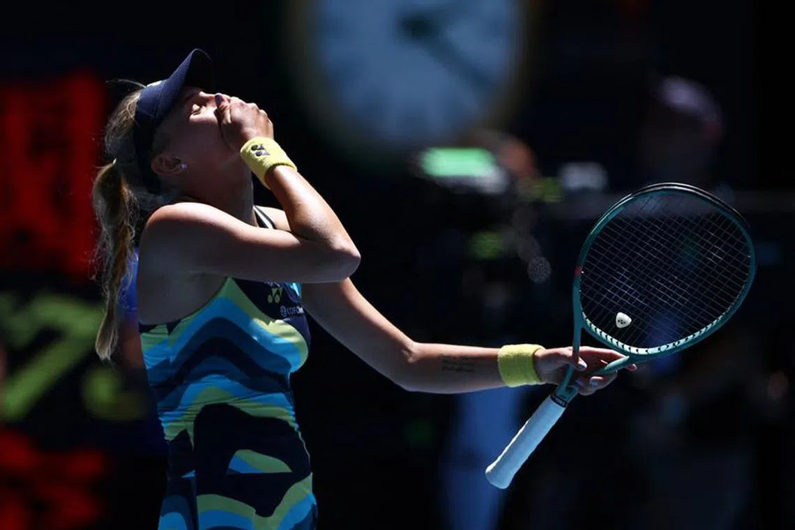 Tennis - Australian Open - Melbourne Park, Melbourne, Australia - January 22, 2024 Ukraine's Dayana Yastremska celebrates after winning her fourth round match against Belarus' Victoria Azarenka REUTERS/Edgar Su