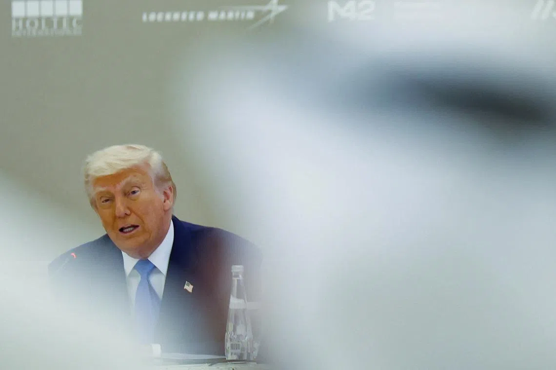 U.S. President Donald Trump speaks as he attends a business forum at Qasr Al Watan during the final stop of his Gulf visit, in Abu Dhabi, United Arab Emirates, May 16, 2025. REUTERS/Amr Alfiky