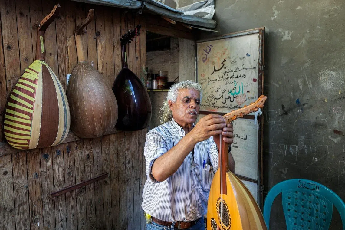 Amid Gaza’s ruins, an oud repairman preserves a piece of Palestinian musical heritage