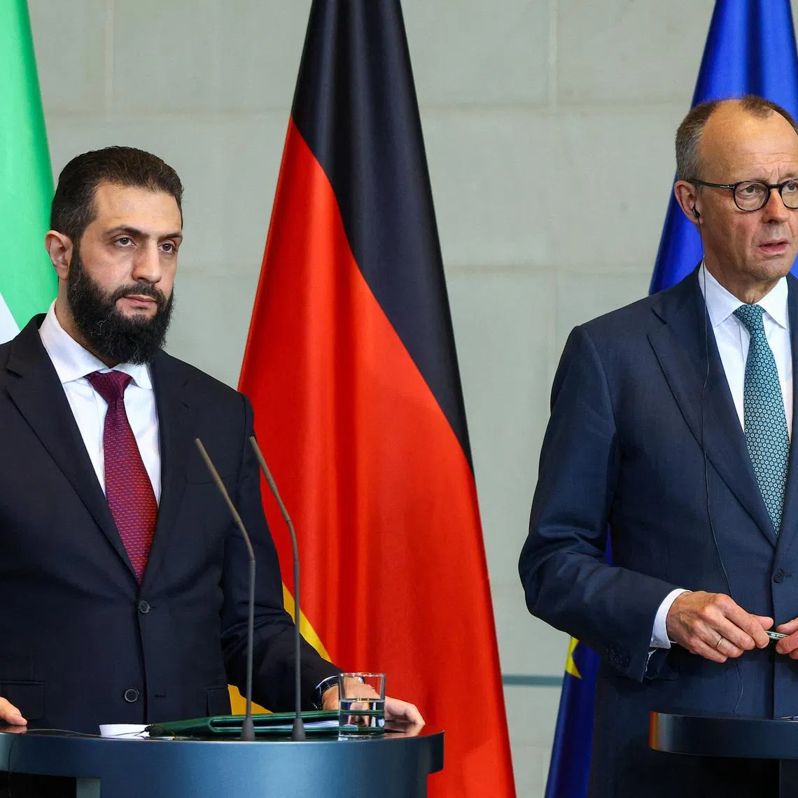 German Chancellor Friedrich Merz and Syrian President Ahmed al-Sharaa hold a press conference at the Chancellery, in Berlin, Germany March 30, 2026. REUTERS/Lisi Niesner