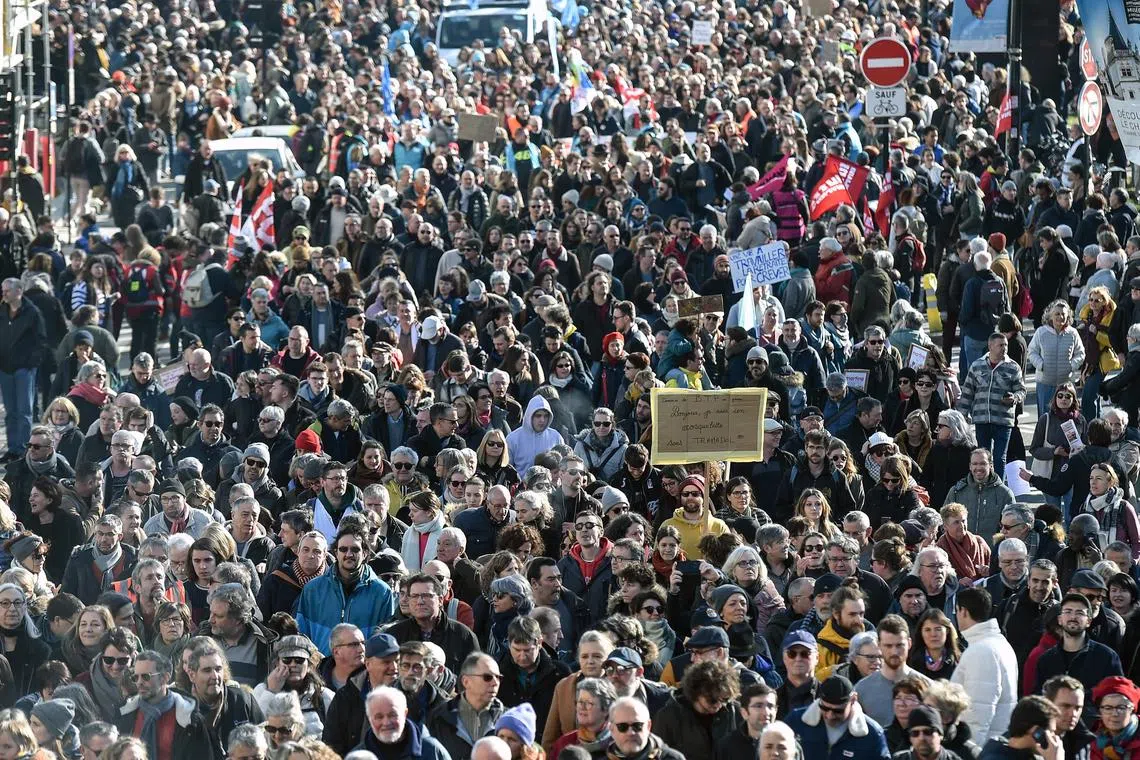 Protesters take part in a demonstration on the fourth day of nationwide rallies in Nantes, on Feb 11.