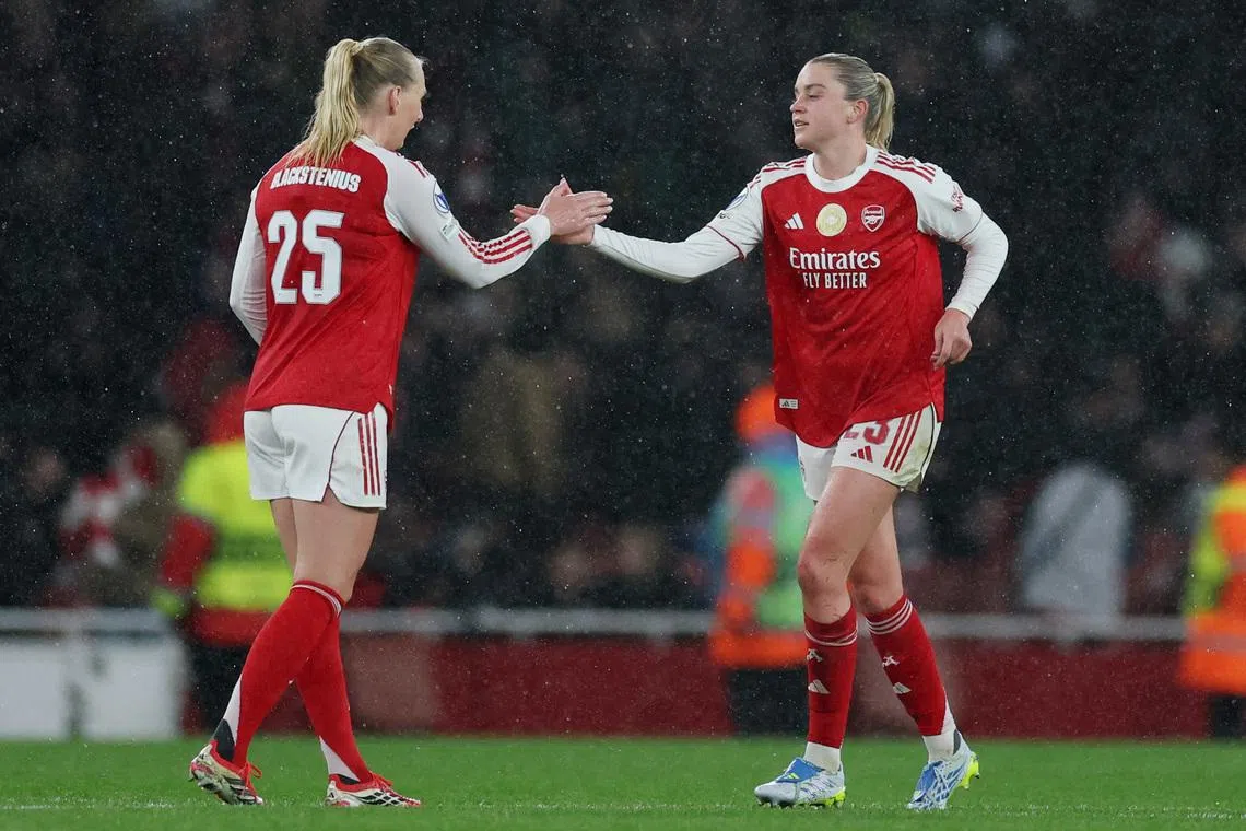 Soccer Football - UEFA Women's Champions League - Quarter Finals - First Leg - Arsenal v Chelsea - Emirates Stadium, London, Britain - March 24, 2026 Arsenal's Alessia Russo celebrates scoring their third goal with Stina Blackstenius Action Images via Reuters/Paul Childs