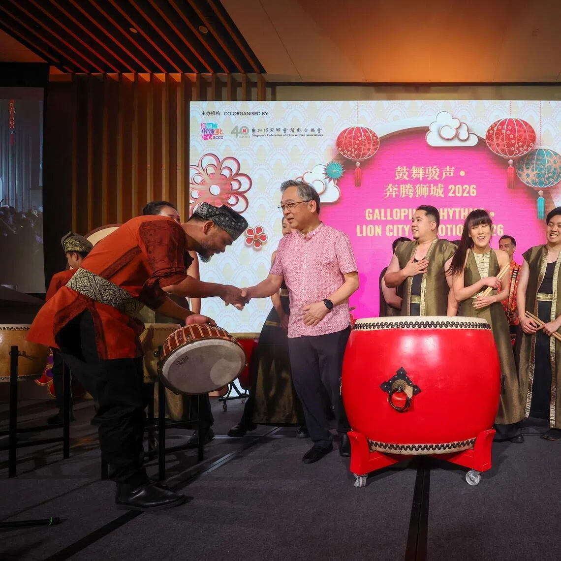 DPM Gan Kim Yong greeting performers at the Spring Reception organised by Singapore Federation of Chinese Clan Association on Feb 19.