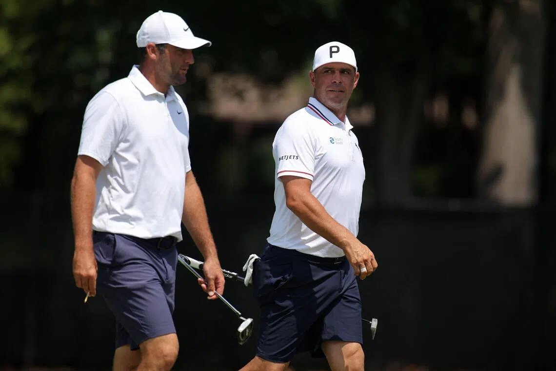 Scottie Scheffler (left) and Gary Woodland at East Lake Golf Club in Atlanta, Georgia, on Aug 26.