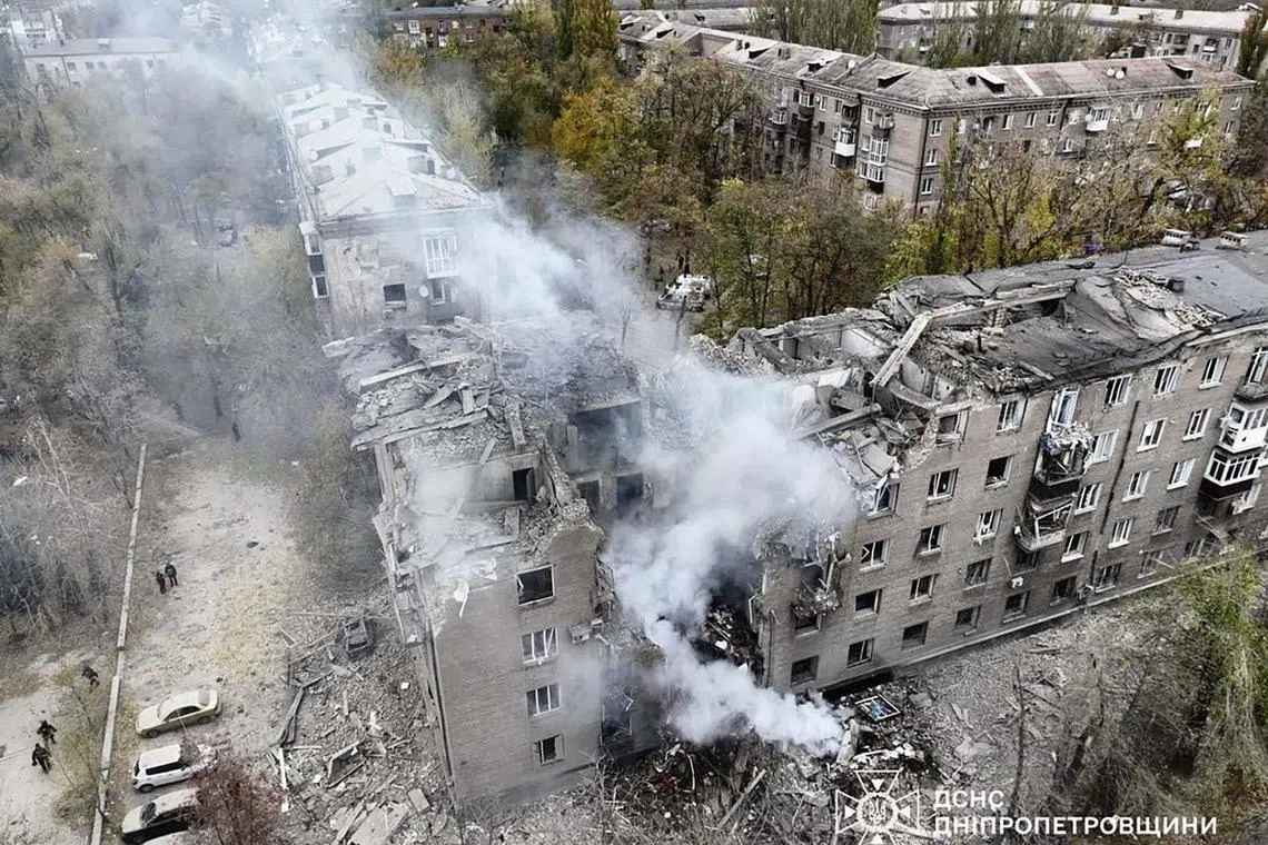 The site of a rocket attack on a five-story residential building in Kryvyi Rih, Ukraine, Nov 11, 2024, amid the Russian invasion. At least seven people were injured, including two children, according to the State Emergency Service of Ukraine (SESU) report. 