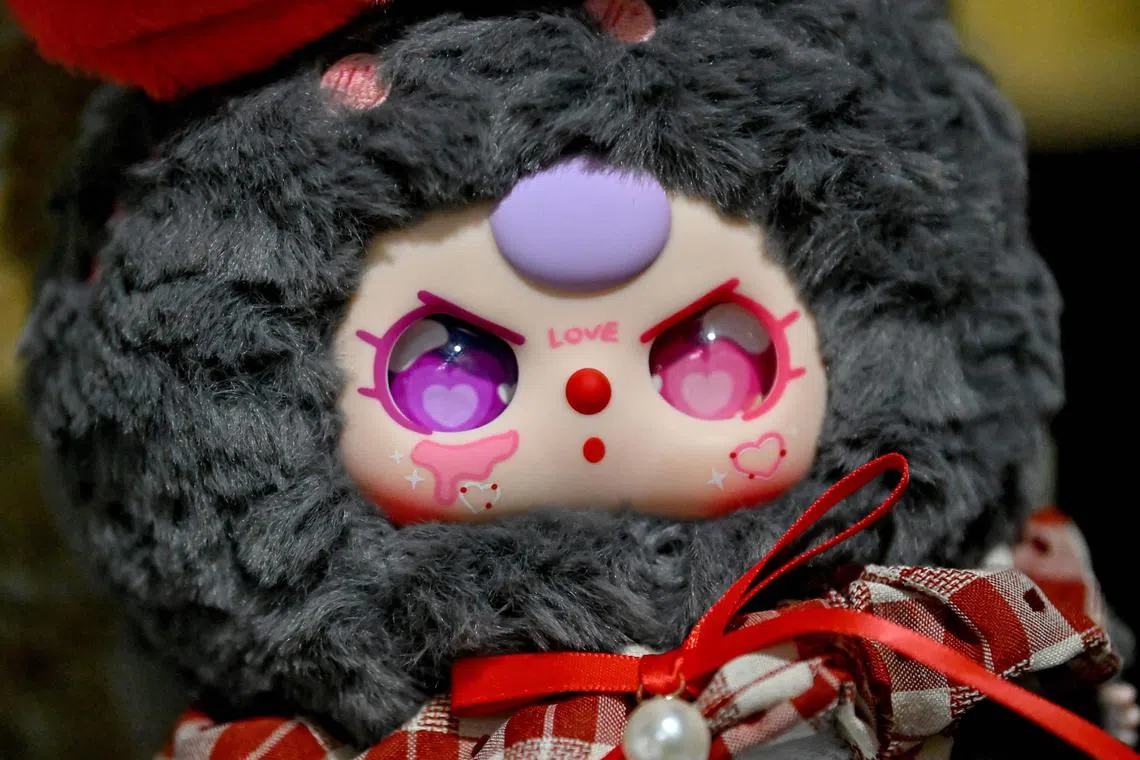 A Baby Three doll, with a marking on its cheek that has been claimed to resemble China's so-called nine-dash line.