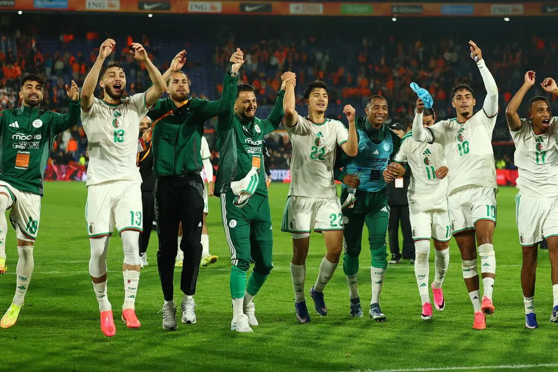 Algeria players celebrate after the match against the Netherlands on June 3. They will face Argentina on June 16 in their opening game in Group J in Kansas City.
