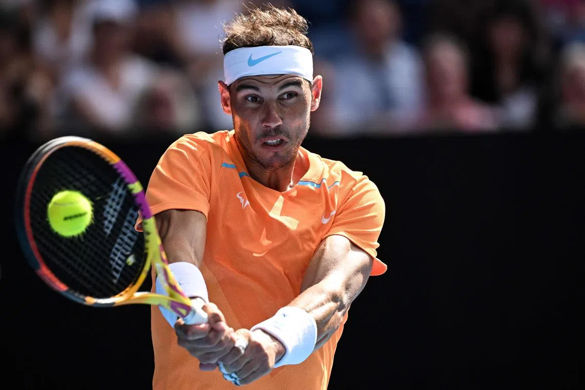 Rafael Nadal hits a return against Jack Draper during their men's singles match at the Australian Open in Melbourne, on Jan 16, 2023.