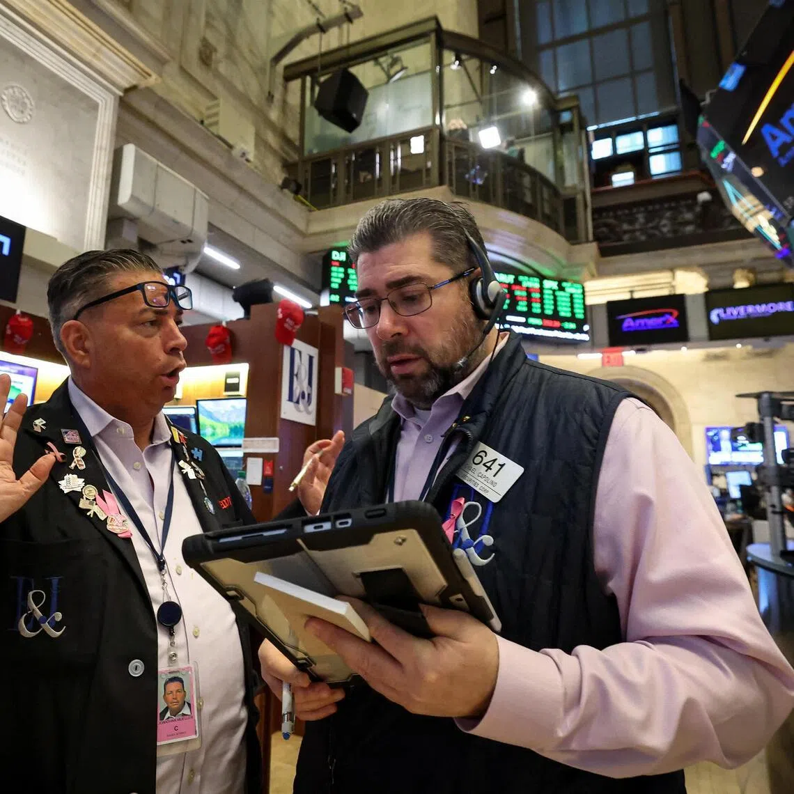 Traders working on the floor of the New York Stock Exchange, in New York City, on Jan 22.   