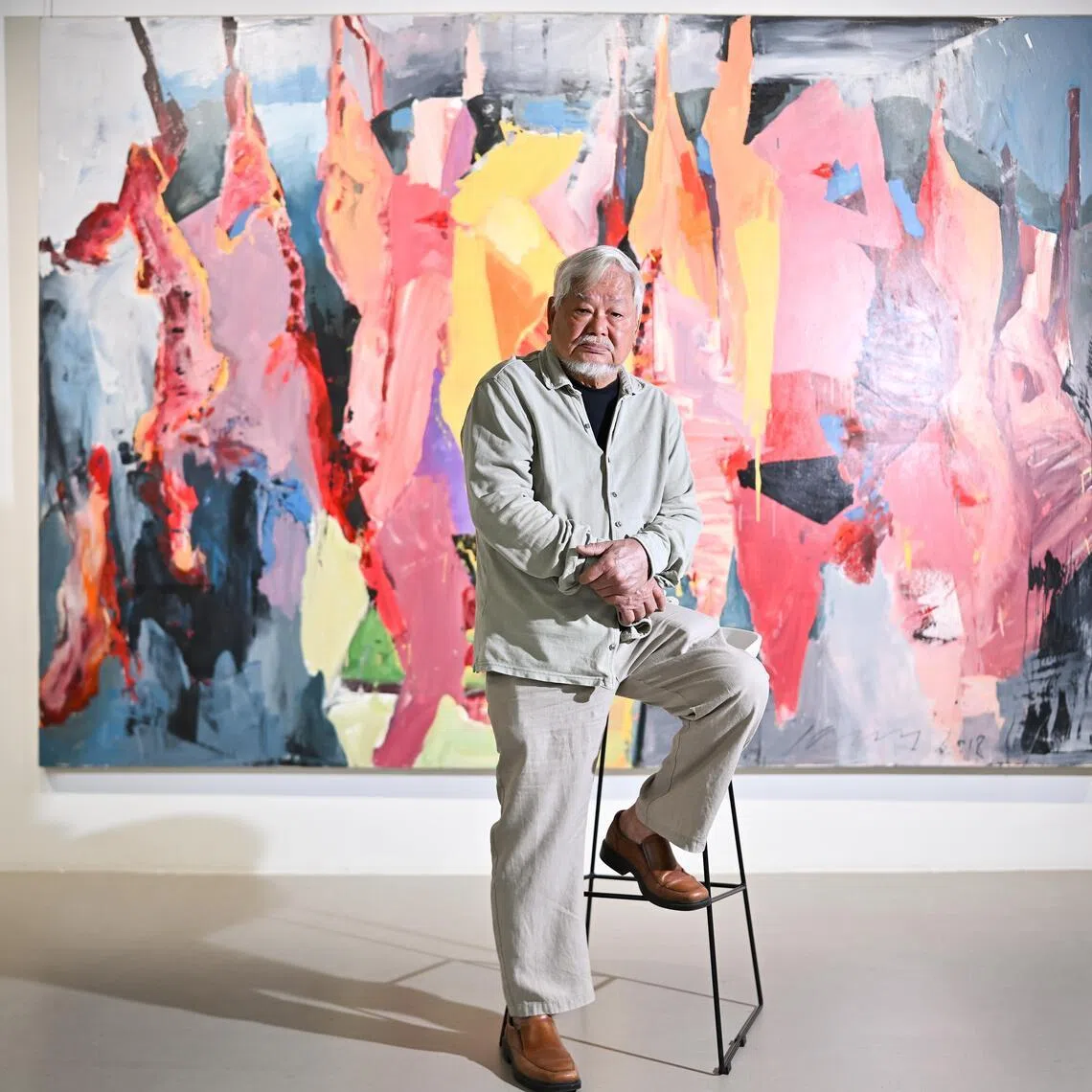 ST20260204-202688400790-Lim Yaohui-Clement Yong-cxwong/
Artist Wong Keen, 84, with his acrylic on canvas painting 'The Source of Supper' at artcommune gallery in Carlton Hotel Singapore on Feb 4, 2026.
For CNY Horse year package.
(ST PHOTO: LIM YAOHUI)