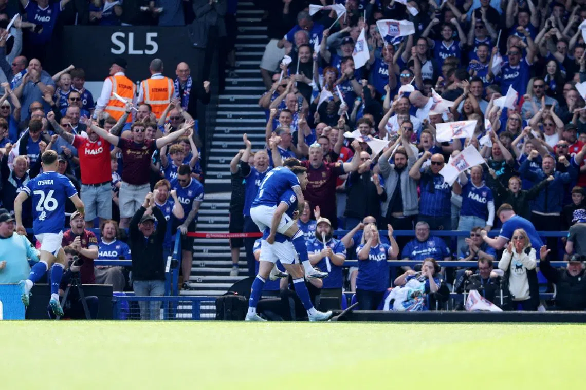 Soccer Football - Championship - Ipswich Town v Queens Park Rangers - Portman Road, Ipswich, Britain - May 2, 2026 Ipswich Town's George Hirst celebrates scoring their first goal with teammates Action Images/John Sibley