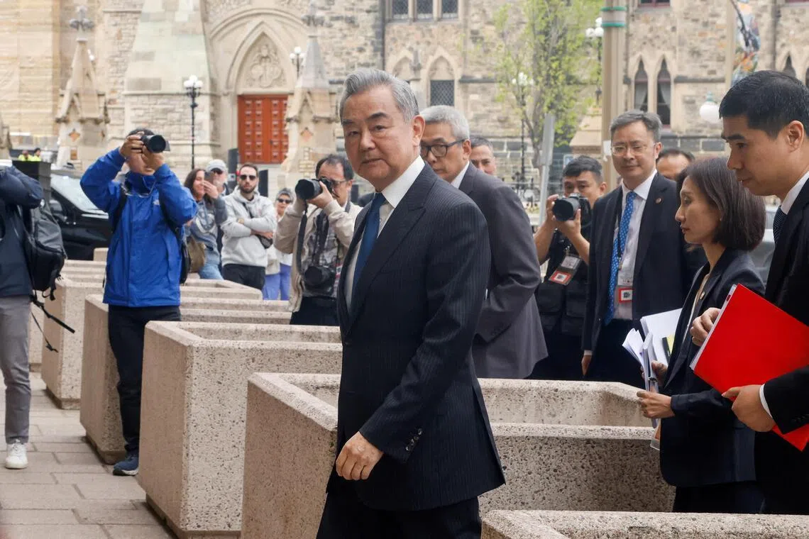 China's Foreign Minister Wang Yi arrives for a meeting with Canada's Prime Minister Mark Carney in Ottawa, Ontario, Canada, May 29, 2026. 