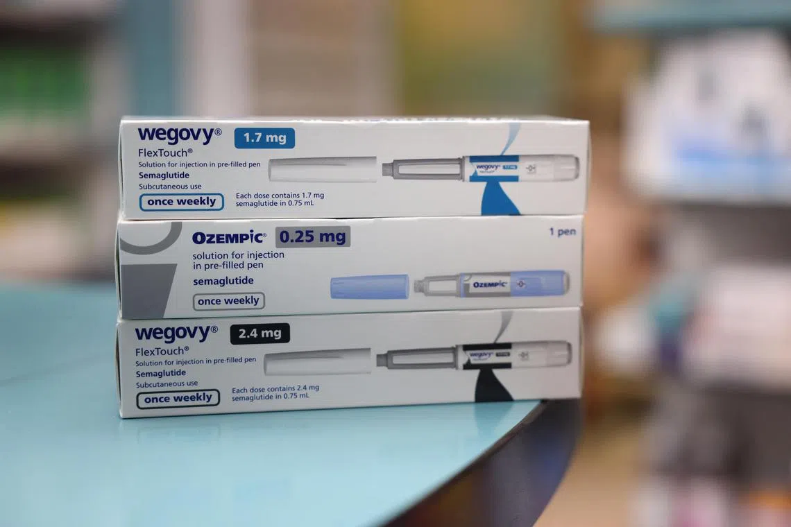 Boxes of Ozempic and Wegovy made by Novo Nordisk seen at a pharmacy in London, Britain.